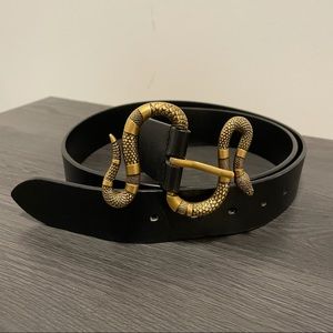 Leather belt with snake buckle